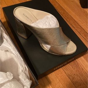 Brand new Kenneth Cole, Metallic gold mule, 
Size: 7.5 (women’s) 
Cross strap